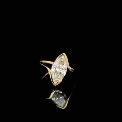Marquise Diamond Bypass Solitaire Ring in Yellow Gold
