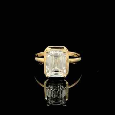 Emerald Cut Diamond Solitaire Ring in Yellow Gold