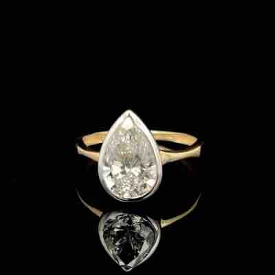 Pear-Cut Diamond Bezel Solitaire Ring in 2 tone