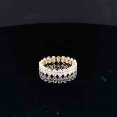 Oval Cut Diamond Eternity Ring in Yellow Gold