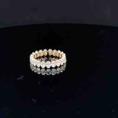 Oval Cut Diamond Eternity Ring in Yellow Gold 3