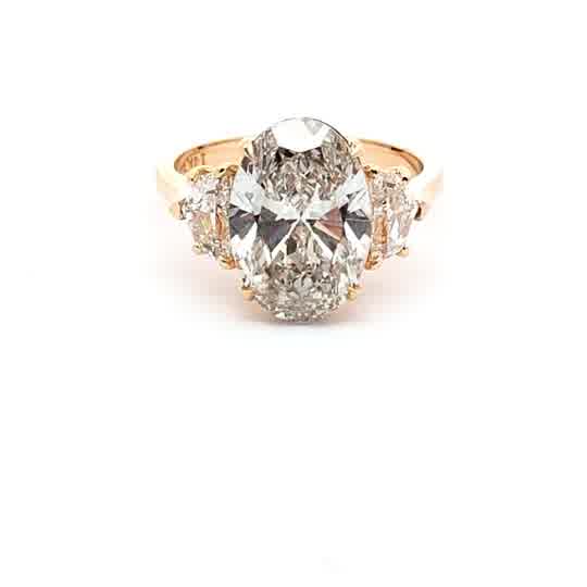 Yellow Gold Ring with Oval Cut Diamond and Accent Stones