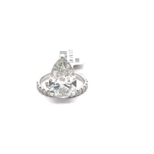 White Gold Multistone Ring with Pear Cut Diamond