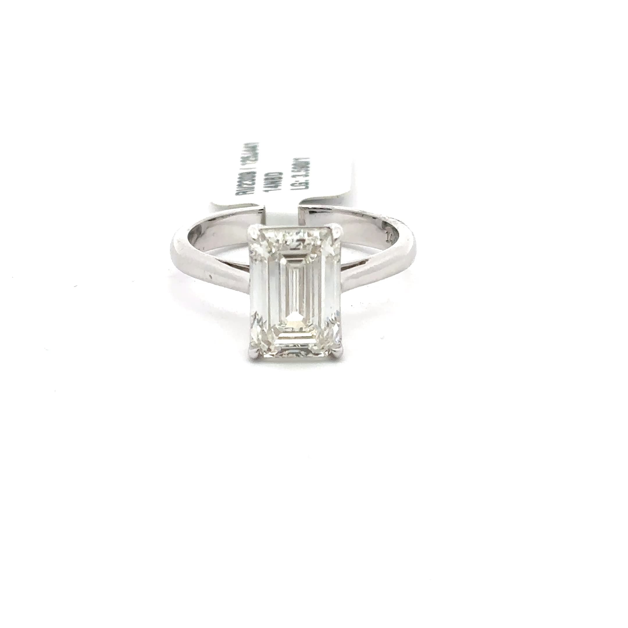 Solitaire Ring with Emerald Cut Diamond 2