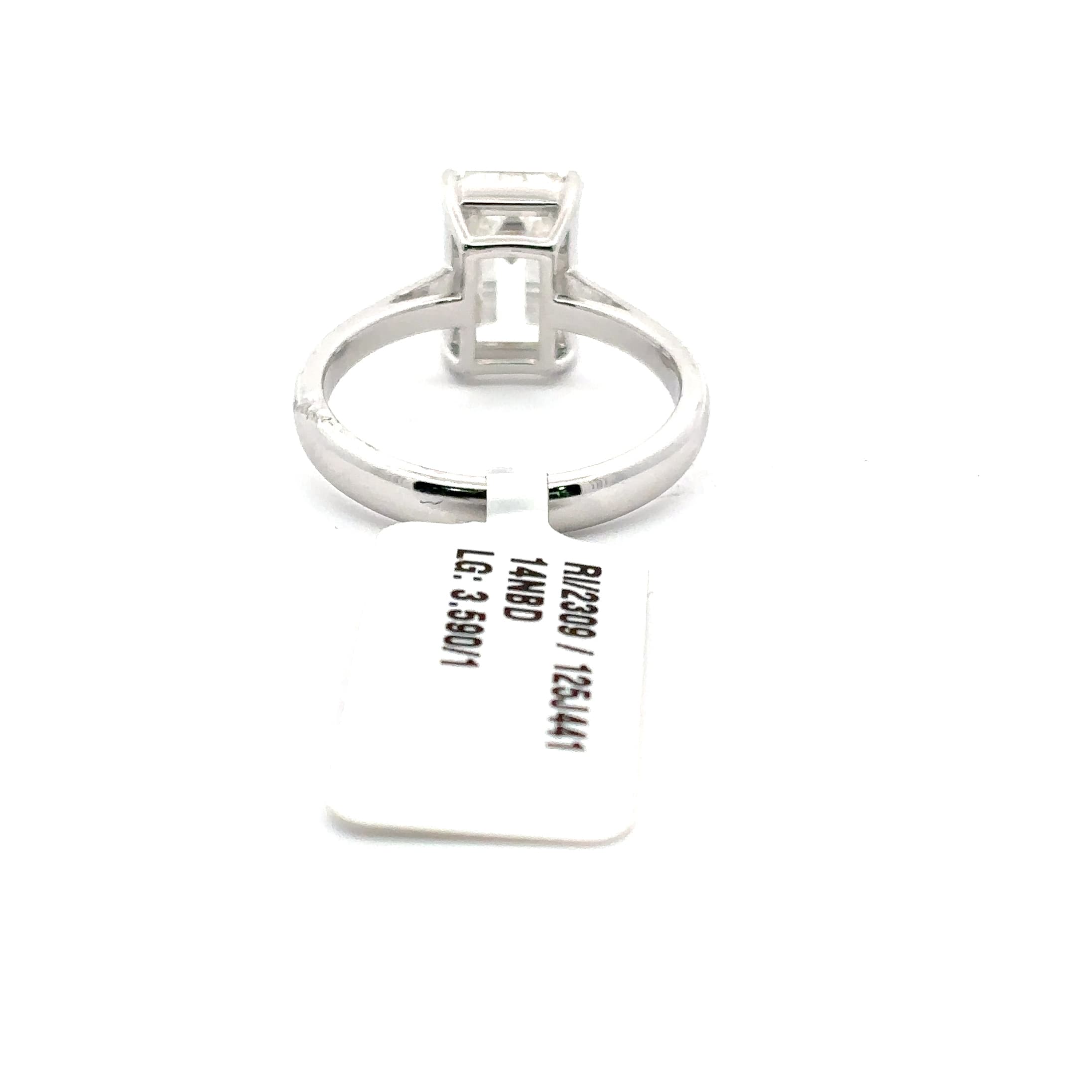 Solitaire Ring with Emerald Cut Diamond 4