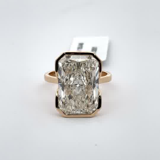 Rose Gold Solitaire Ring with Emerald Cut Diamond