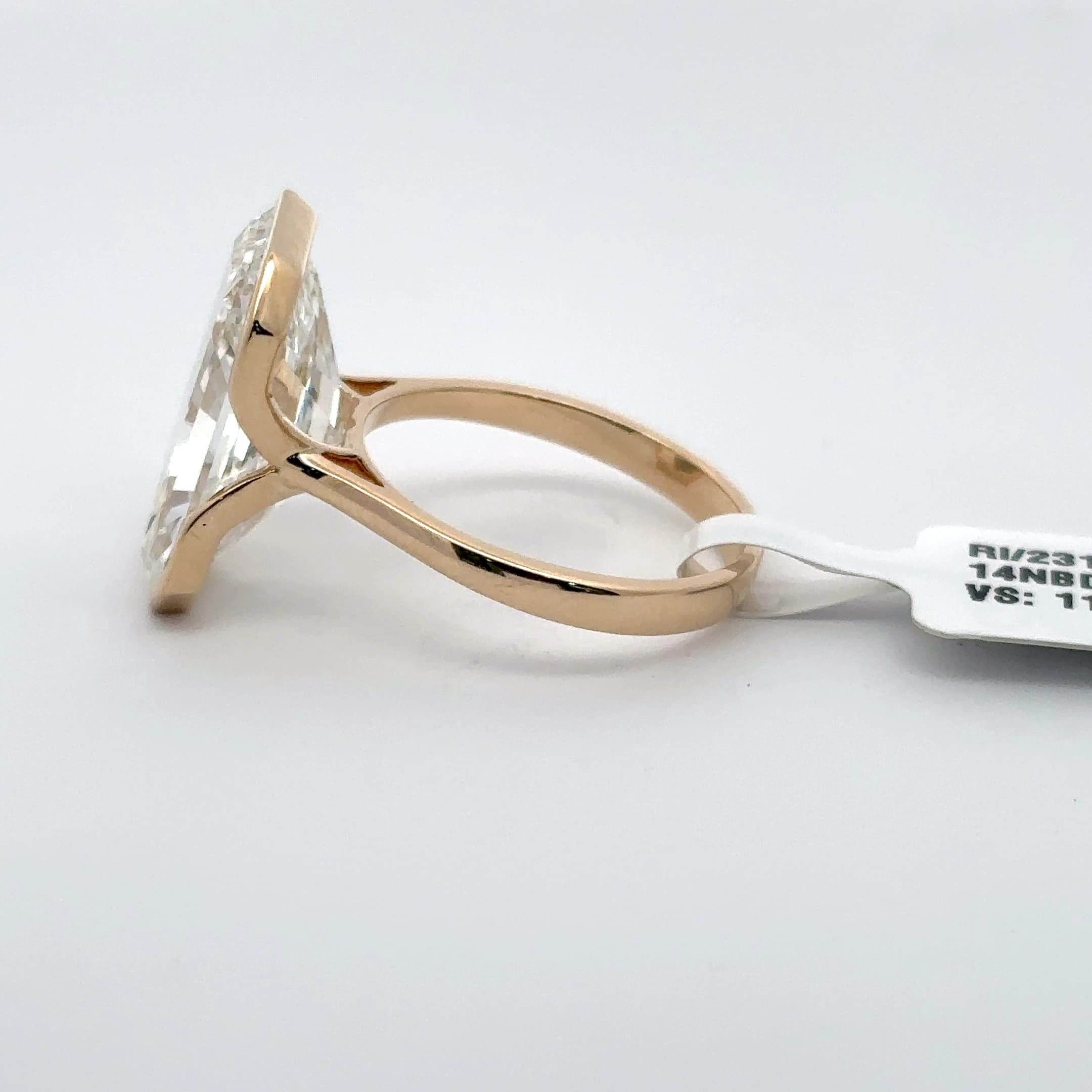 Rose Gold Solitaire Ring with Emerald Cut Diamond 3