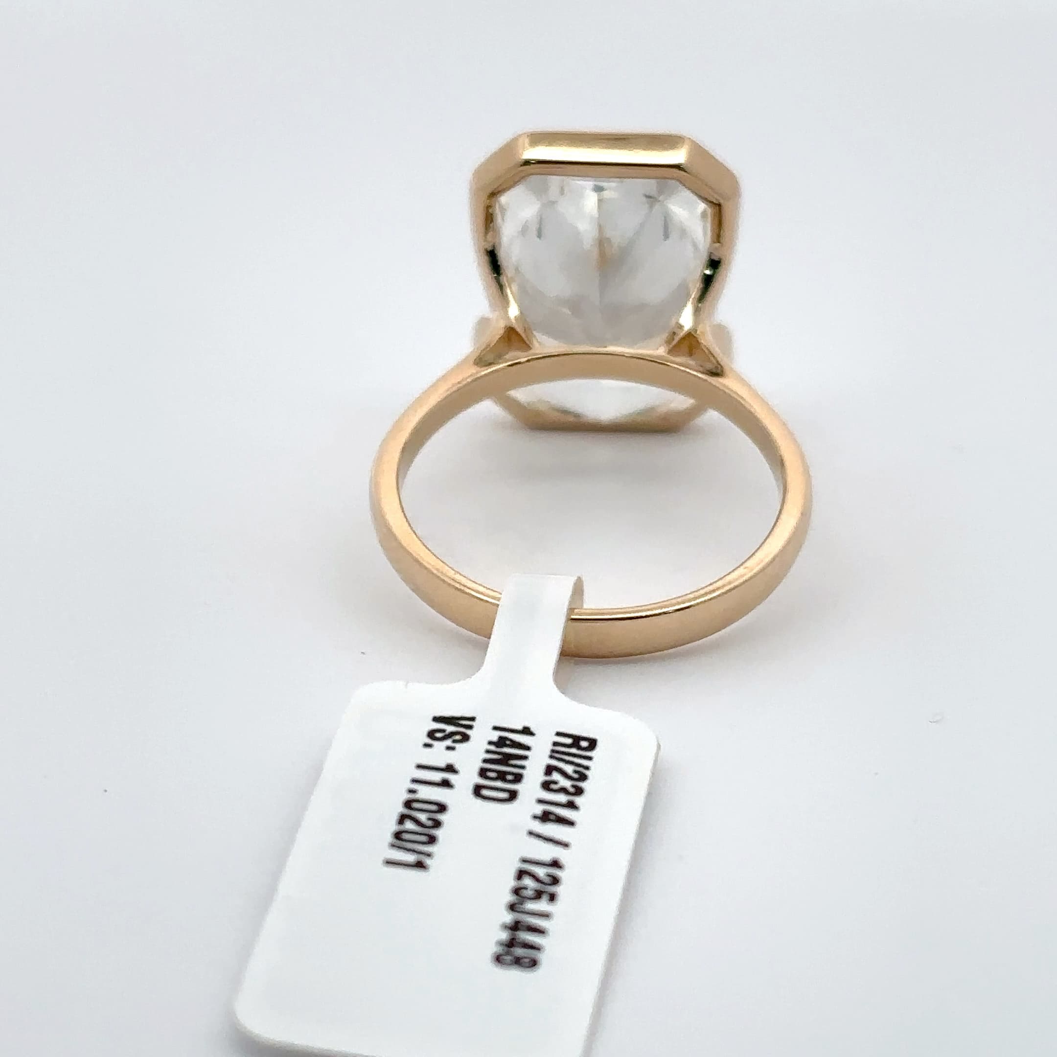Rose Gold Solitaire Ring with Emerald Cut Diamond 4