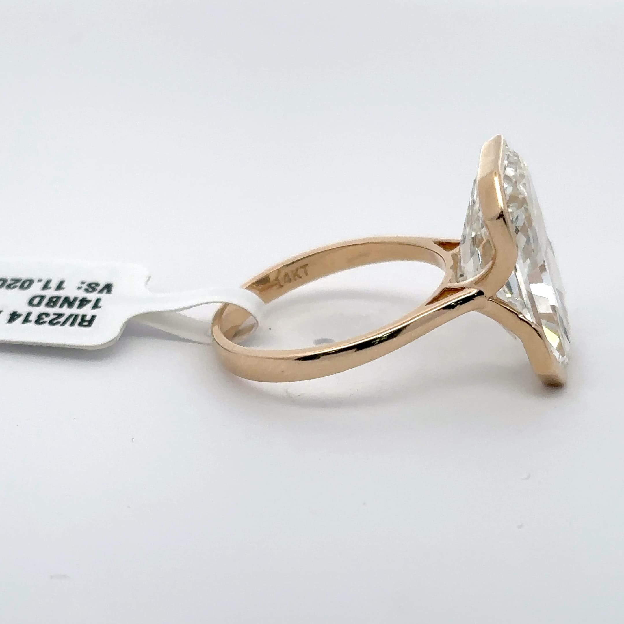 Rose Gold Solitaire Ring with Emerald Cut Diamond 5