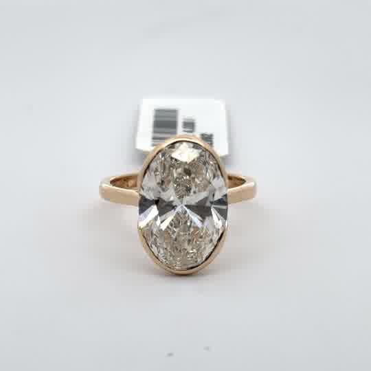 Rose Gold Solitaire Ring with Oval Cut Diamond