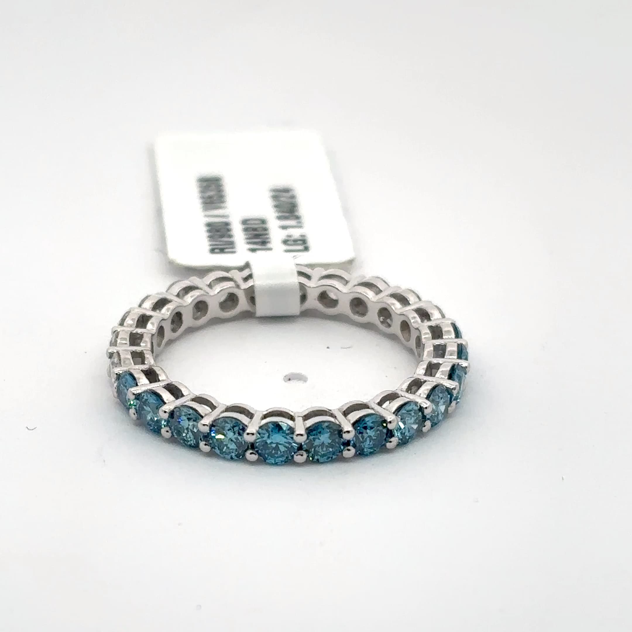 White Gold Eternity Ring with Round Blue Sapphires 2