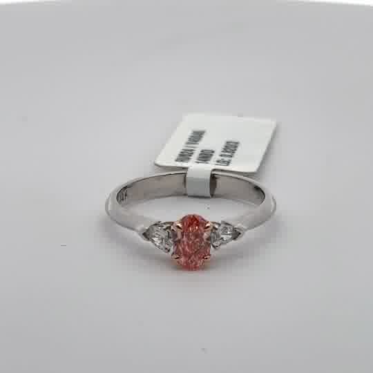 Rose Gold Ring with Oval Orange Diamond Accented by Diamonds