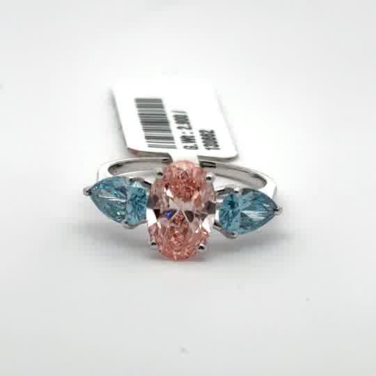 White Gold Multistone Ring with Oval Cut Diamond