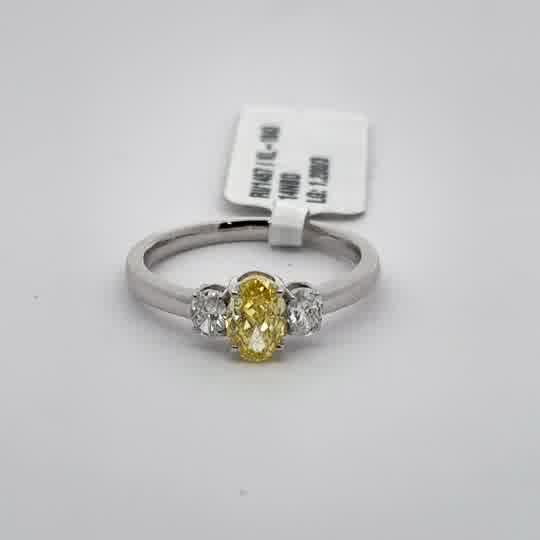 White Gold Ring with Oval Cut Diamond Center Stone