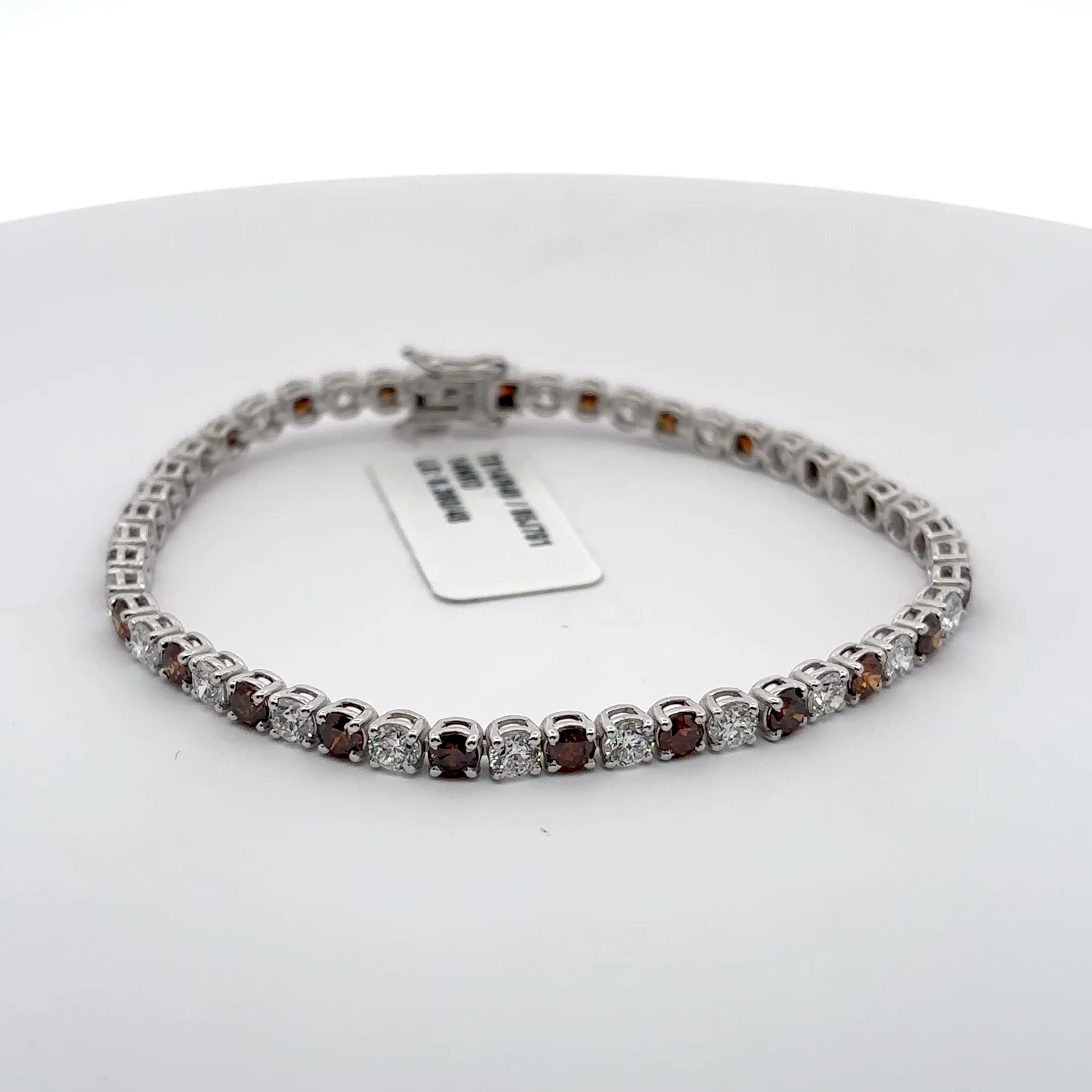 White Gold Tennis Bracelet with Reddish Orange and white rounds 2