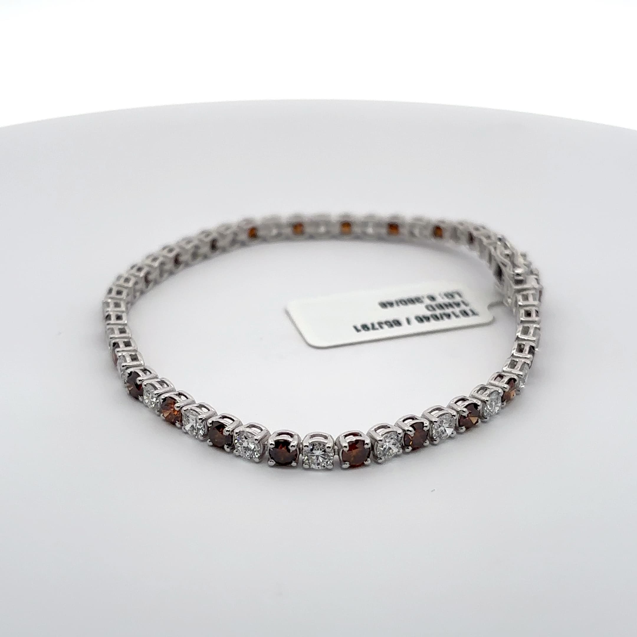 White Gold Tennis Bracelet with Reddish Orange and white rounds 3