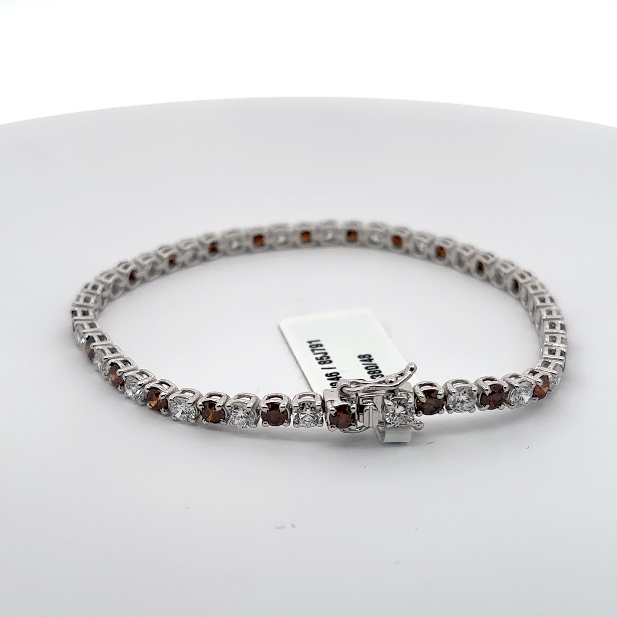 White Gold Tennis Bracelet with Reddish Orange and white rounds 4