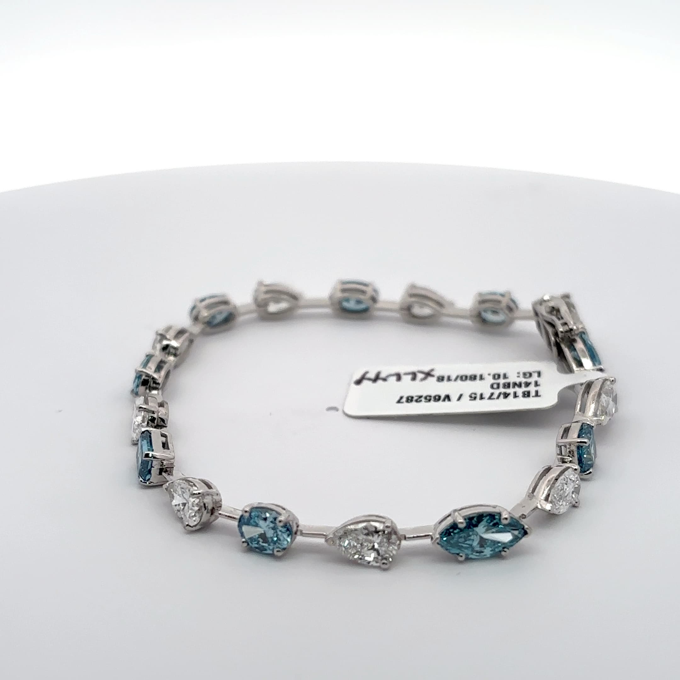 Tennis Bracelet with blue aquamarine mix fancy shapes and white pear Cut Diamonds 3