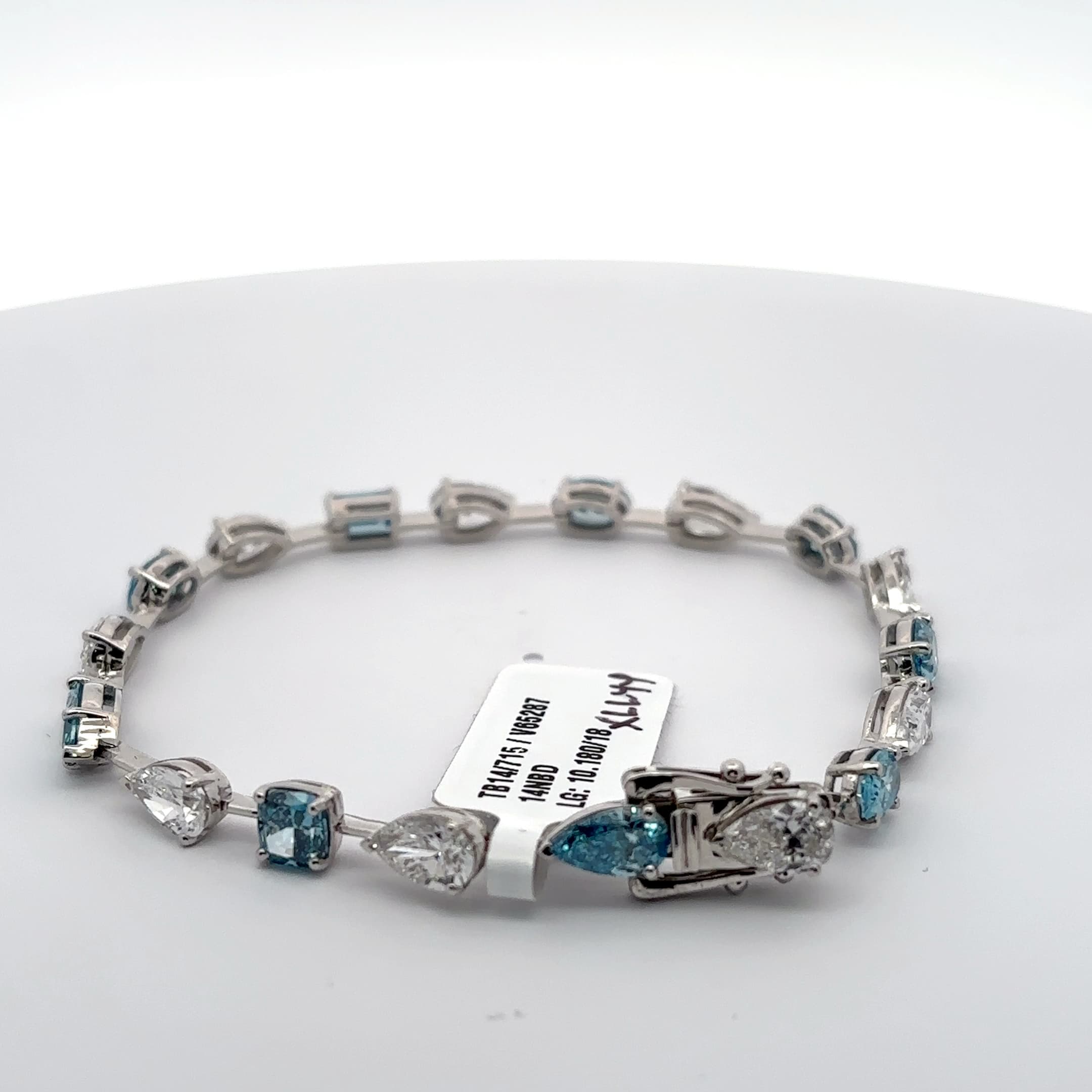 Tennis Bracelet with blue aquamarine mix fancy shapes and white pear Cut Diamonds 4