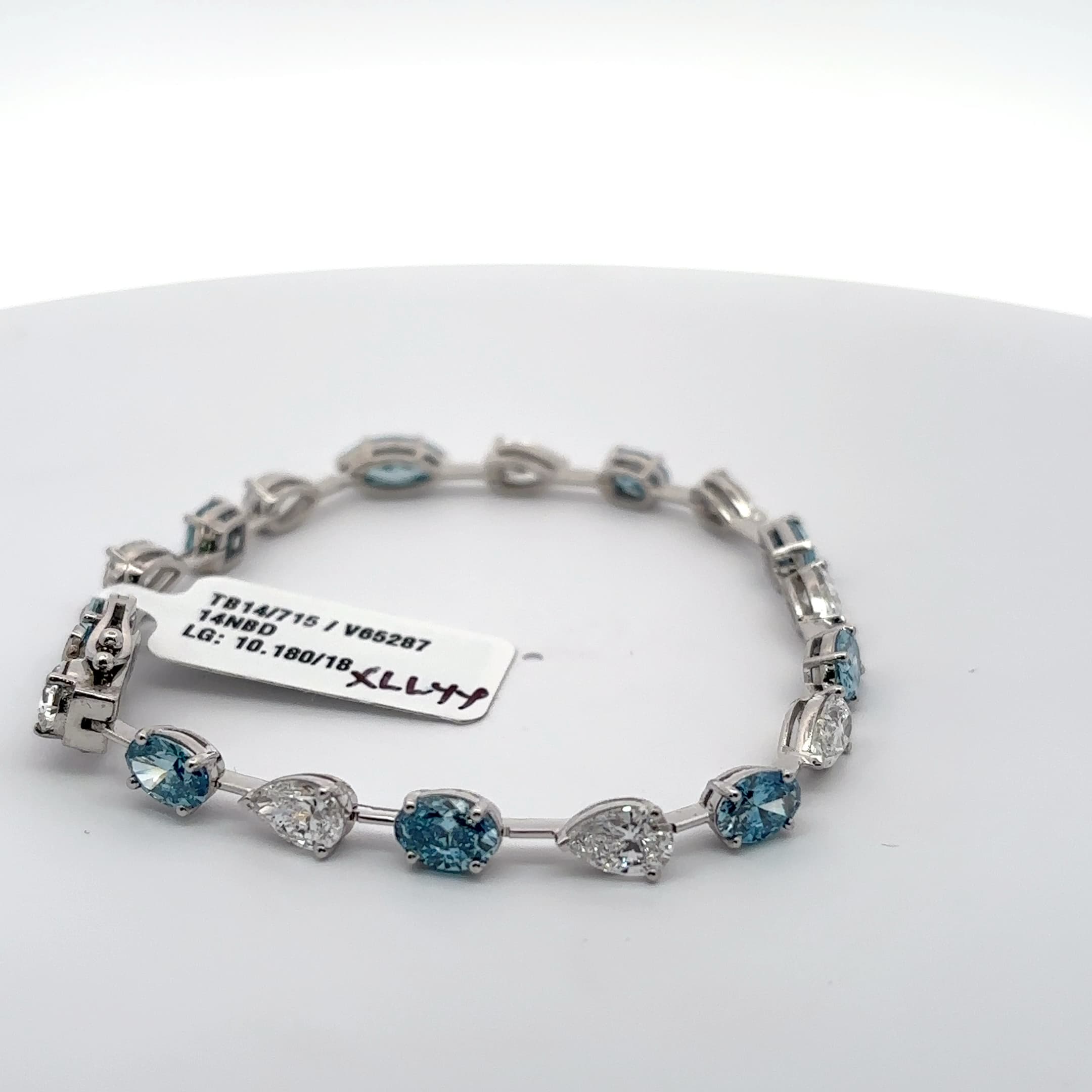 Tennis Bracelet with blue aquamarine mix fancy shapes and white pear Cut Diamonds 5