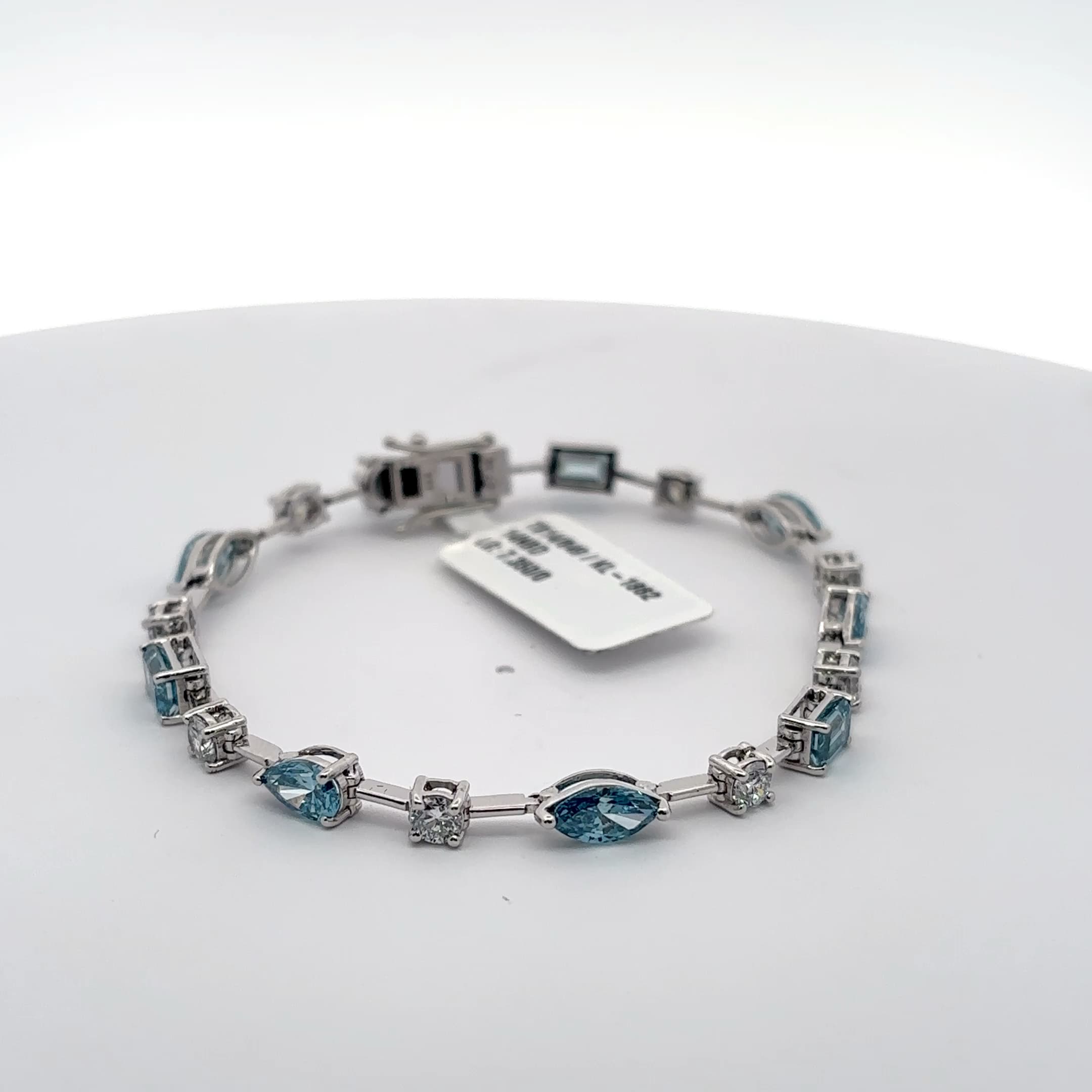 White Gold Tennis Bracelet with blue aquamarine colour in fancy shapes with rounds 2