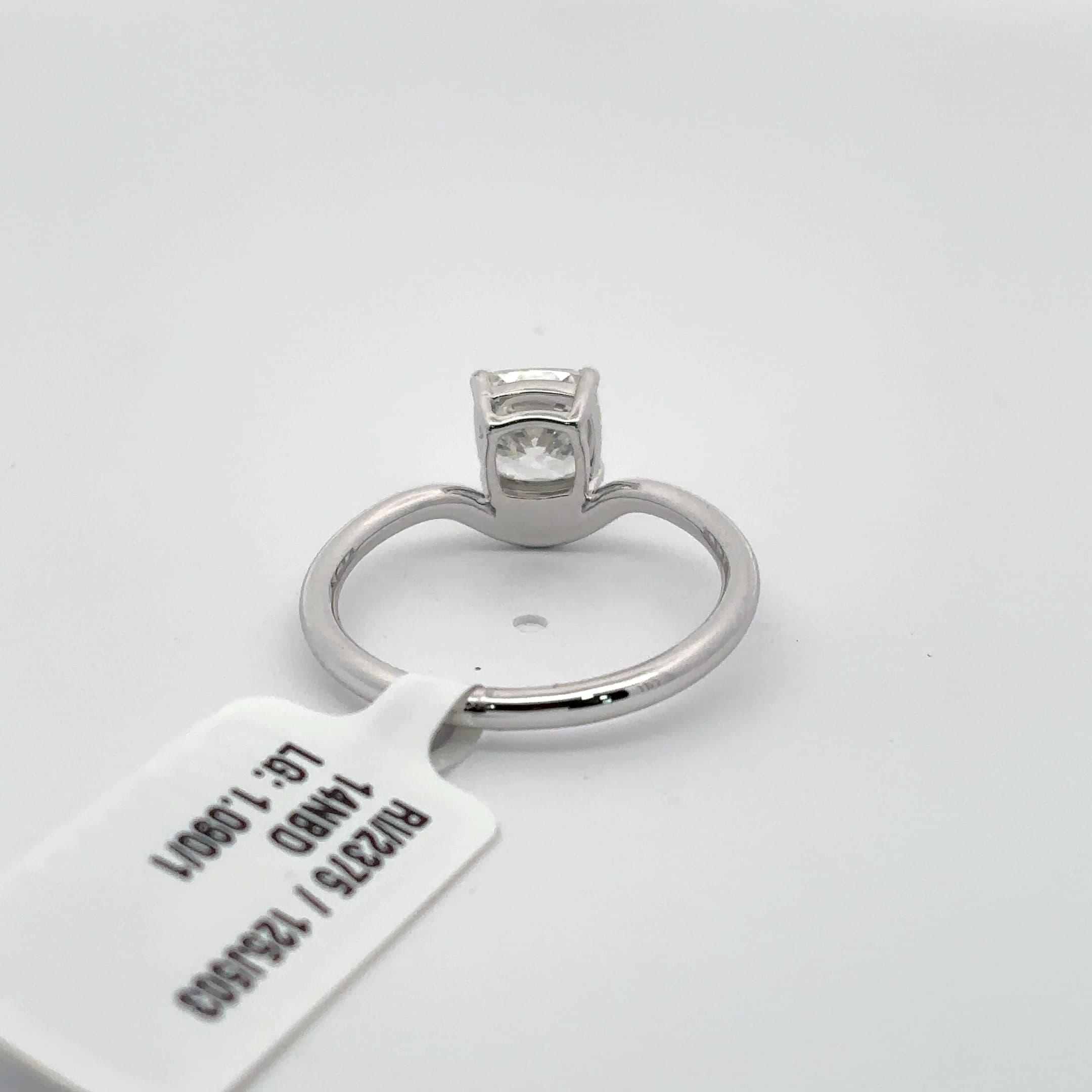 Solitaire Ring with Cushion Cut Diamond in White Gold 4
