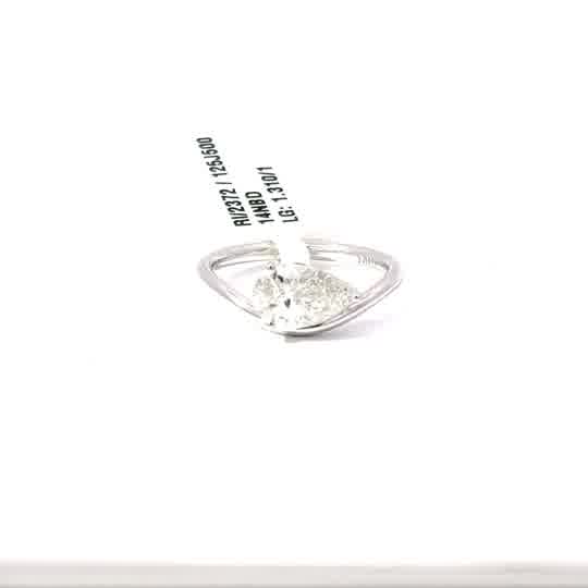 White Gold Solitaire Ring with Pear Cut Diamond