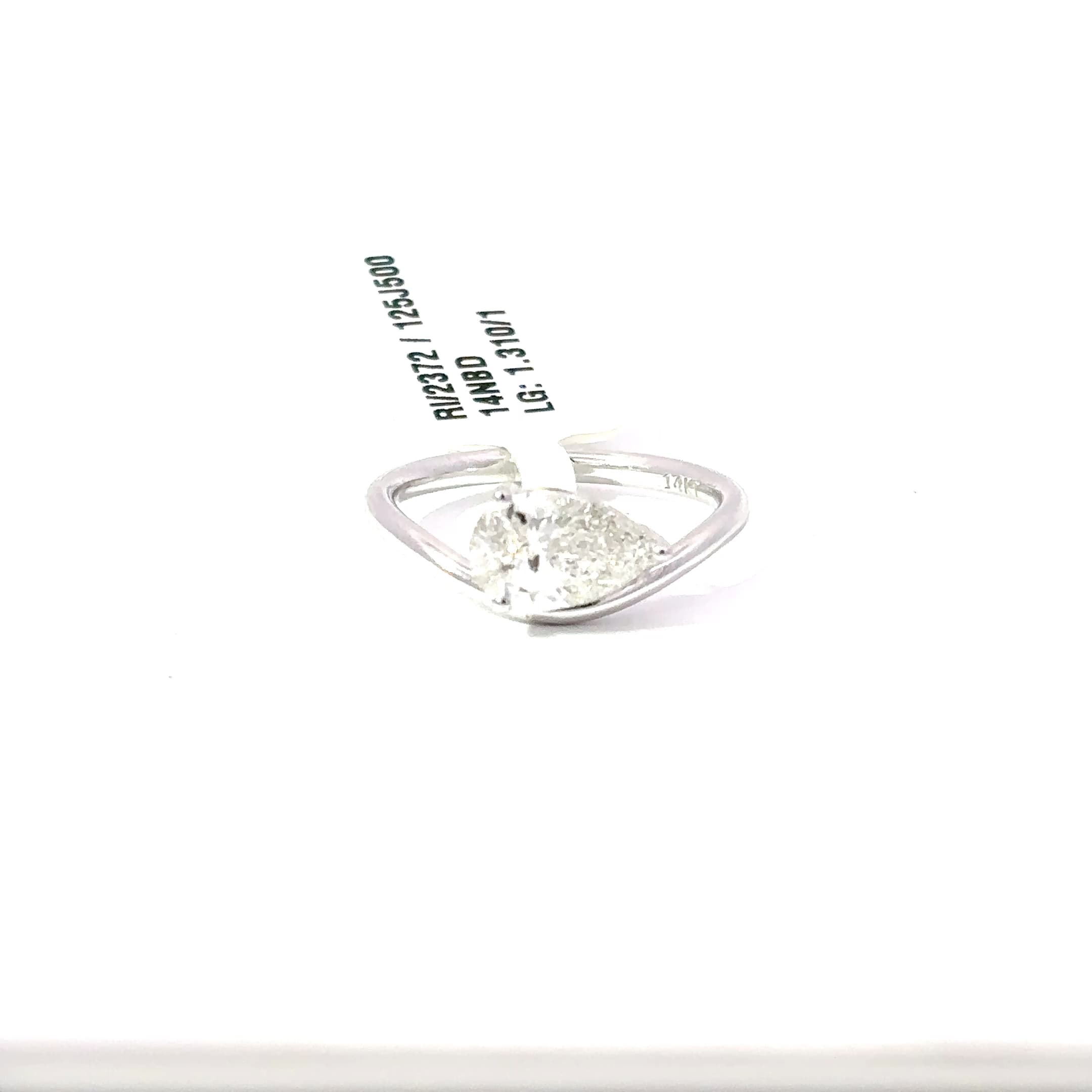 White Gold Solitaire Ring with Pear Cut Diamond 2