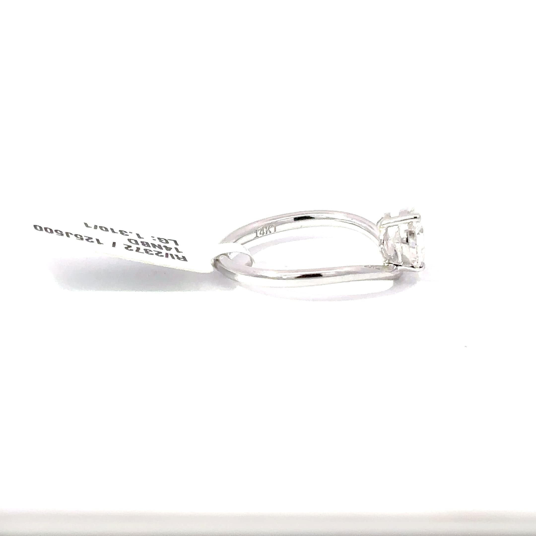 White Gold Solitaire Ring with Pear Cut Diamond 5