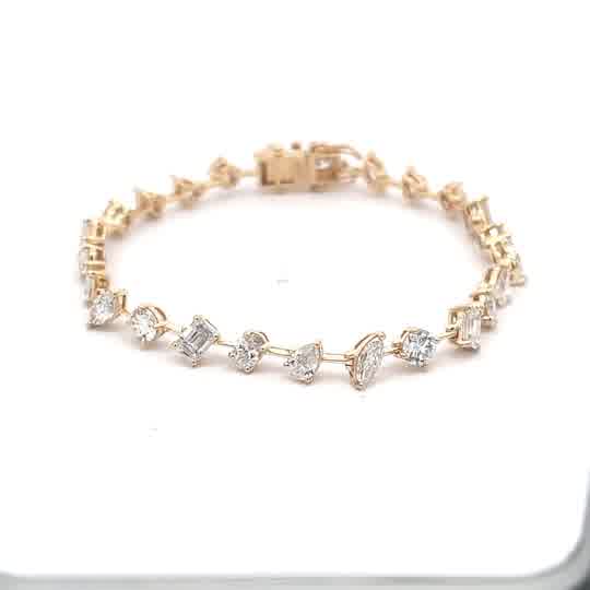 Yellow Gold Tennis Bracelet with mix fancy shape Diamonds