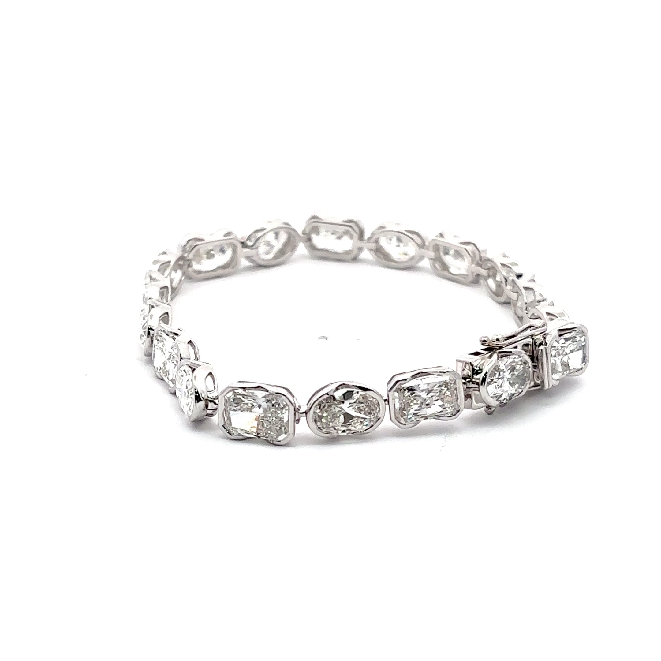 White Gold Tennis Bracelet with Oval and Radint Cut Diamonds in half bezel set 3