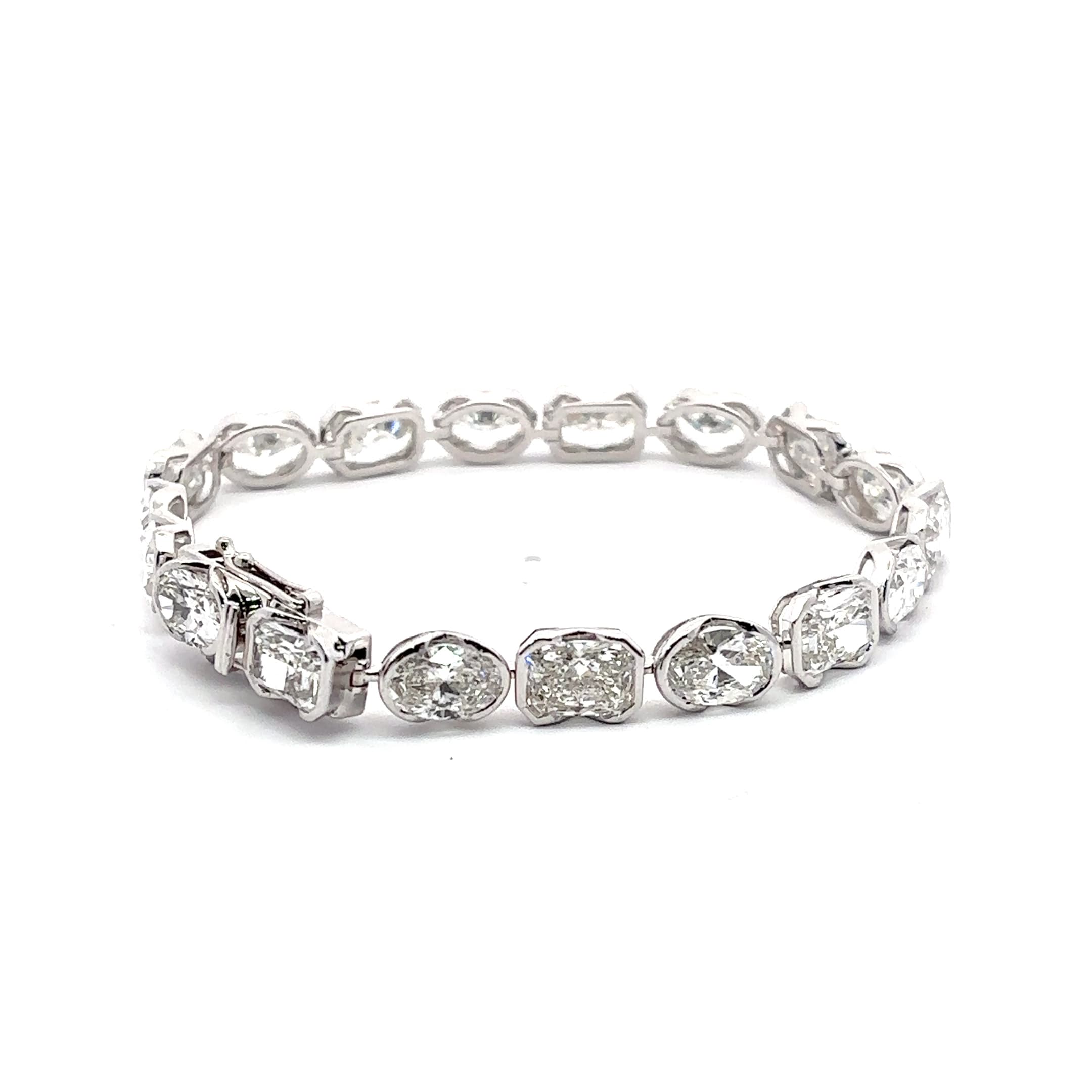 White Gold Tennis Bracelet with Oval and Radint Cut Diamonds in half bezel set 4