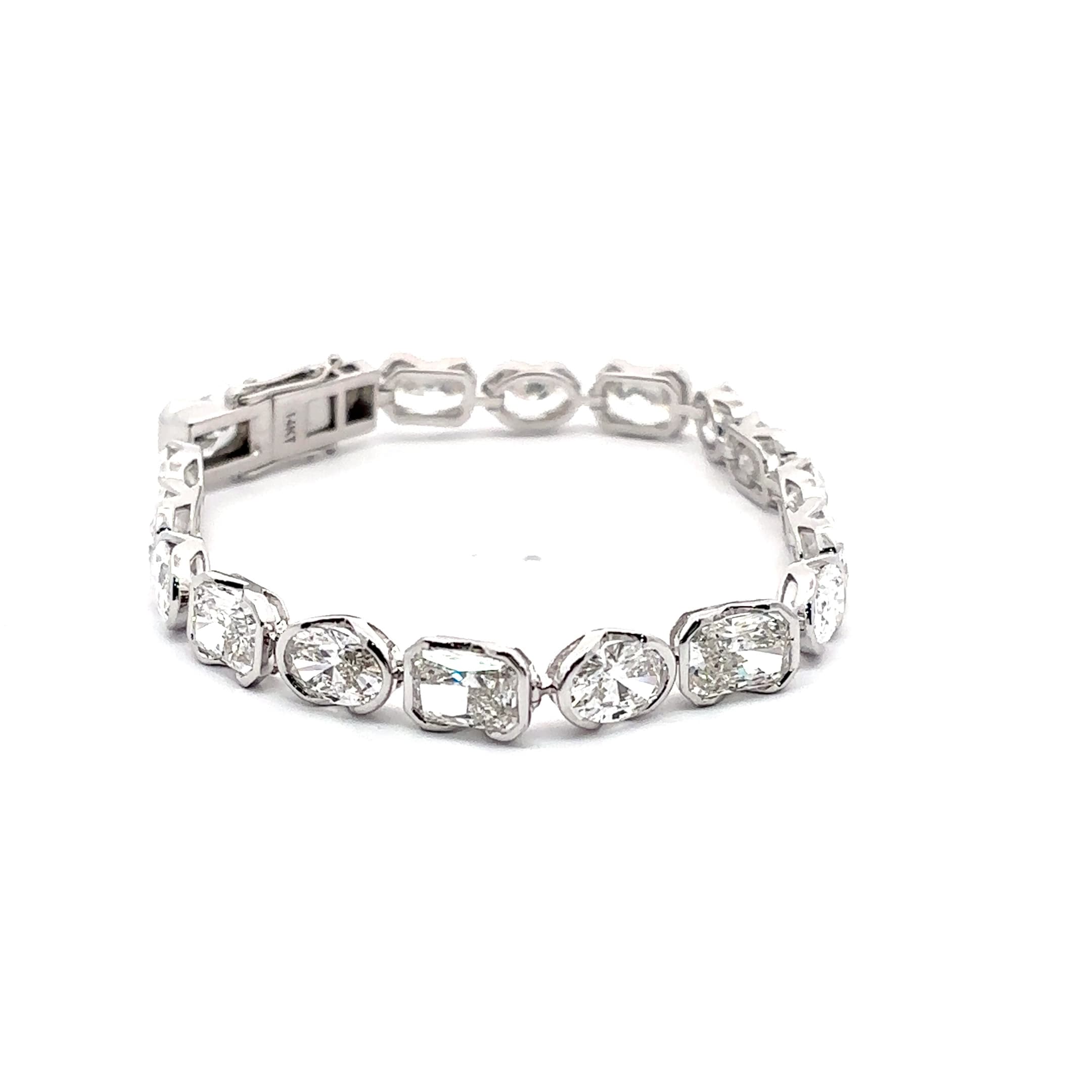 White Gold Tennis Bracelet with Oval and Radint Cut Diamonds in half bezel set 5