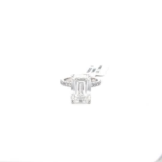 Engagement Ring with Emerald Cut Diamond in White Gold