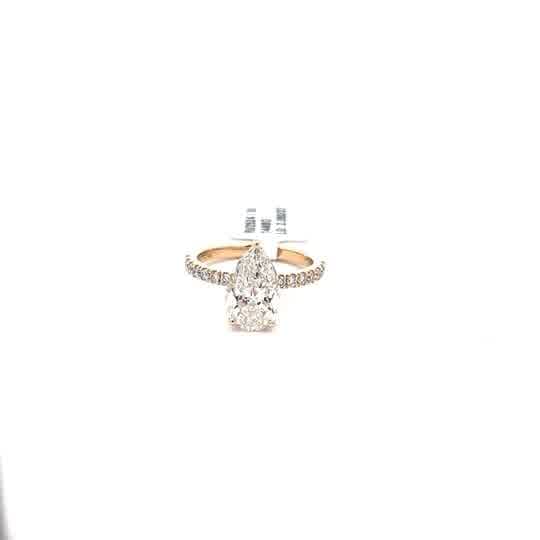 Rose Gold Engagement Ring with Pear-Cut Diamond