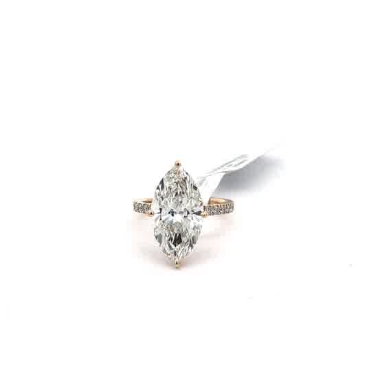 Rose Gold Engagement Ring with Pear Cut Diamond