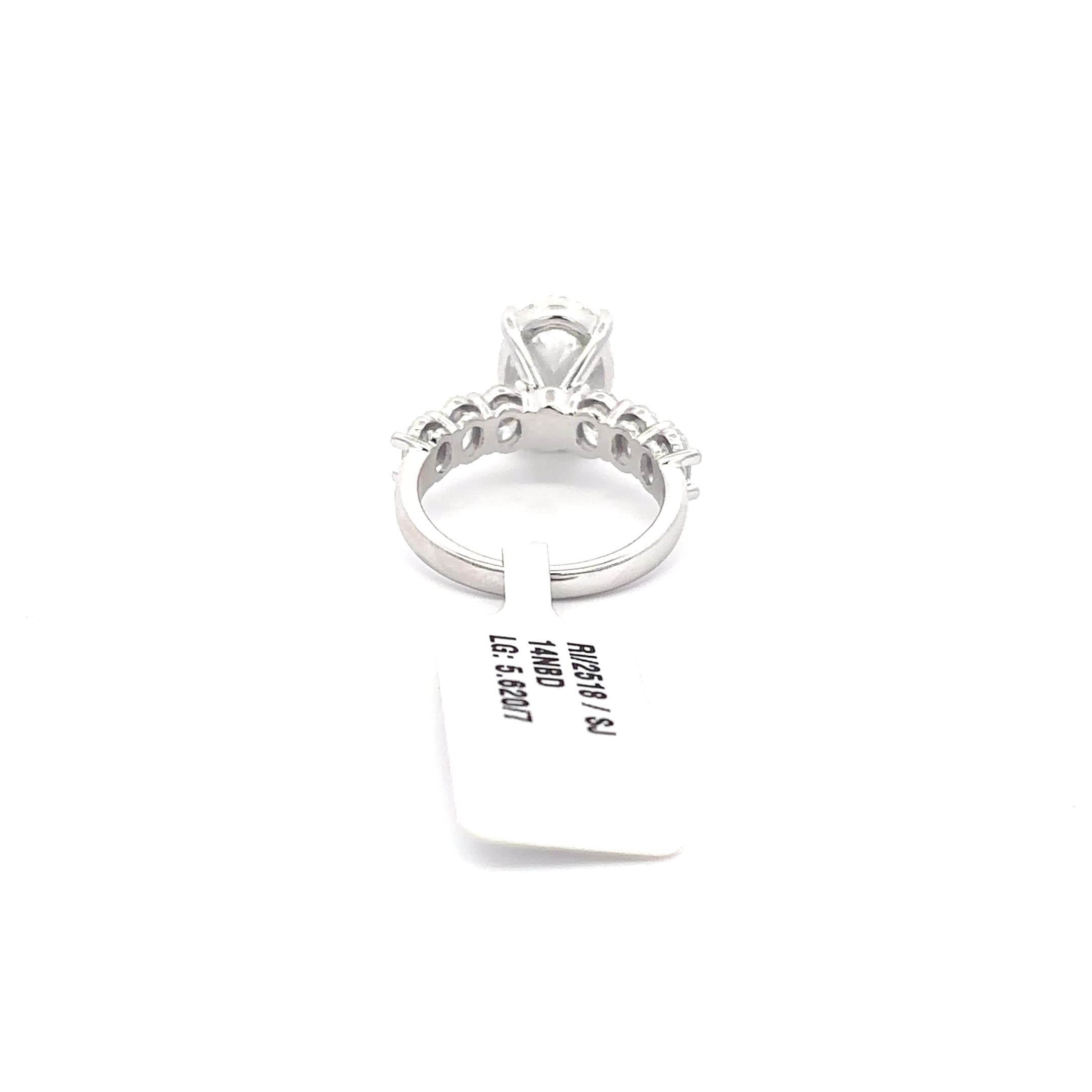 Multistone Ring with Oval Cut Diamond. :62cts 4