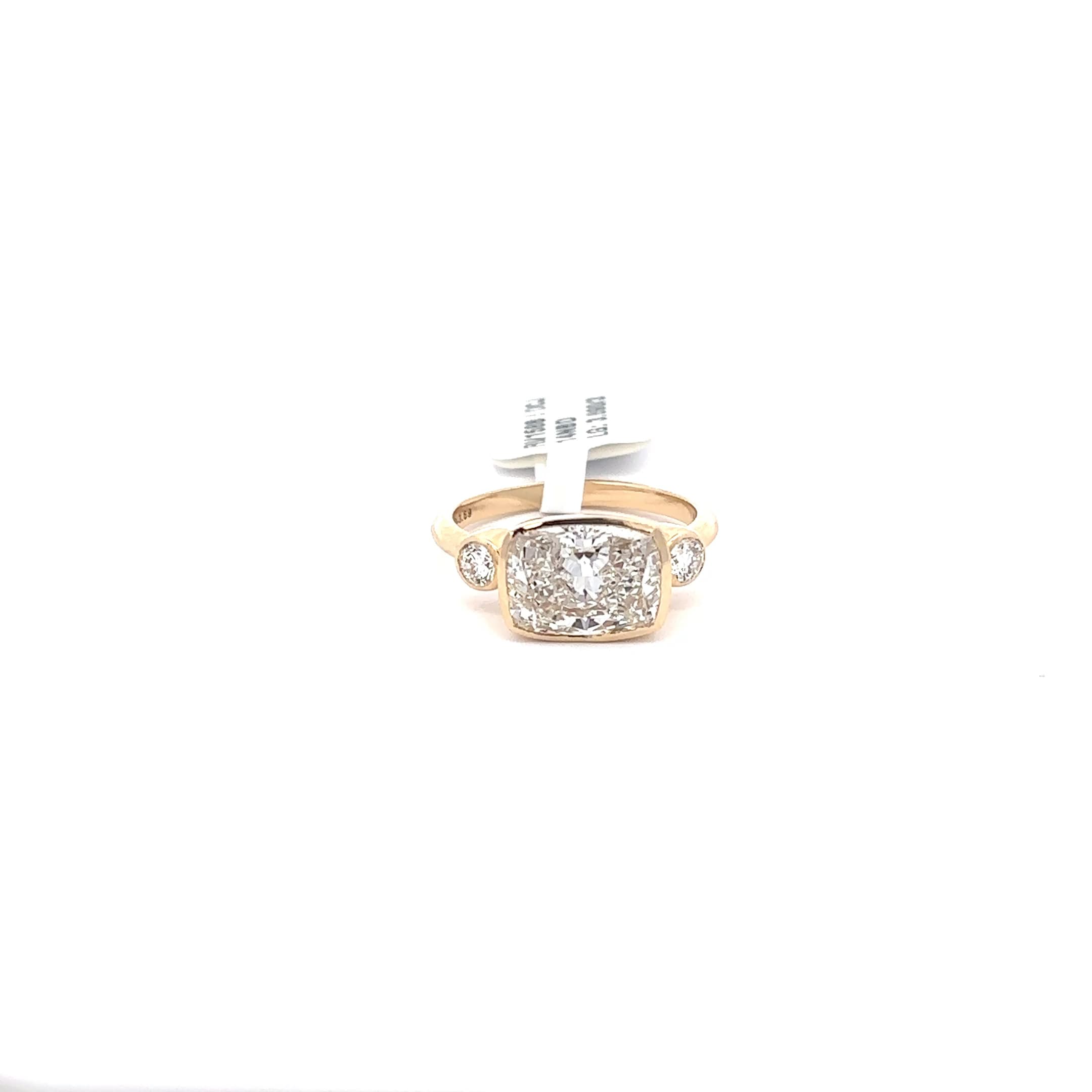 Cushion Cut Diamond Three-Stone Ring in Yellow Gold 2