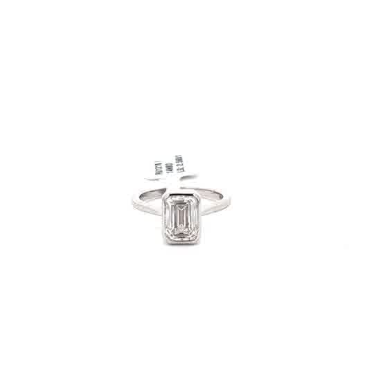 White Gold Solitaire Ring with Emerald Cut Diamond