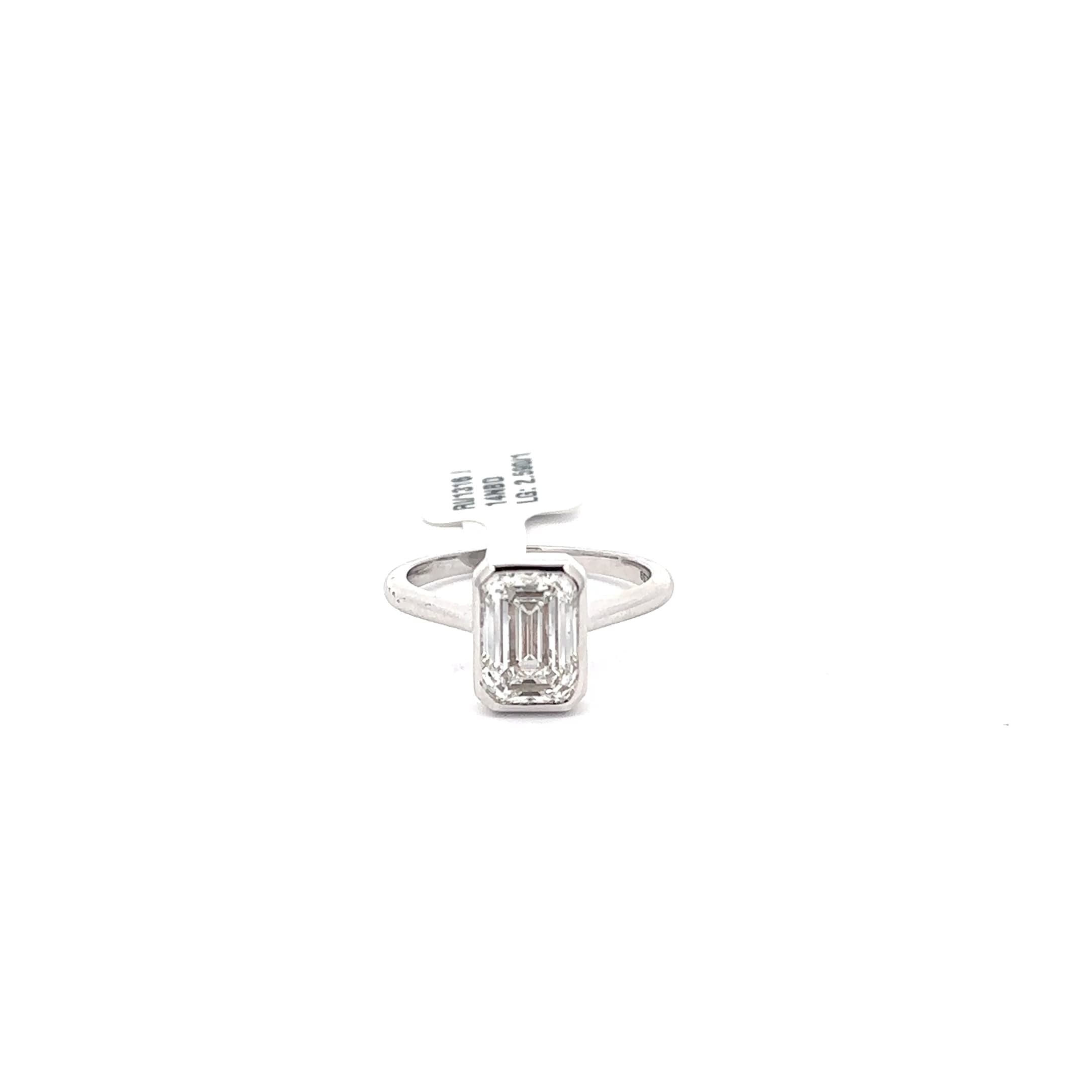 White Gold Solitaire Ring with Emerald Cut Diamond 2