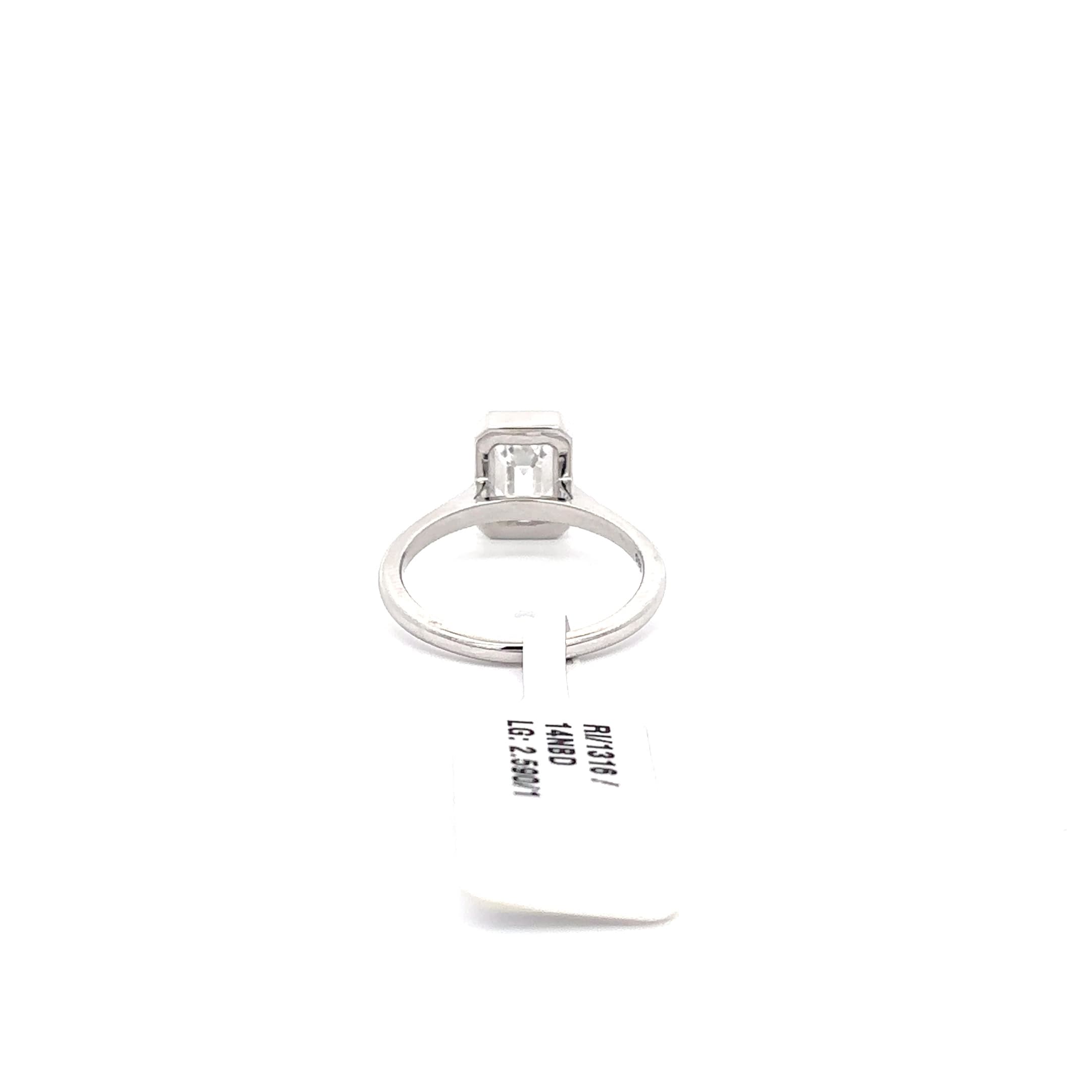White Gold Solitaire Ring with Emerald Cut Diamond 4