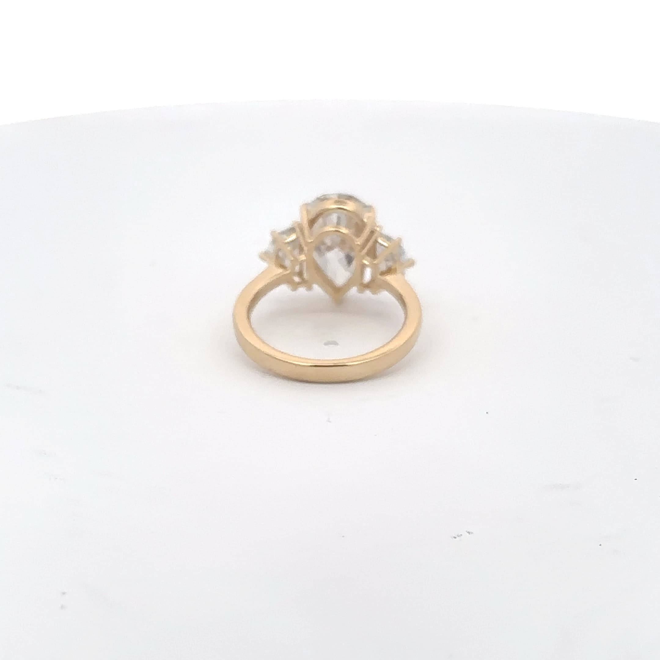 Yellow Gold Three-Stone Ring with Pear-Shaped Diamond 4