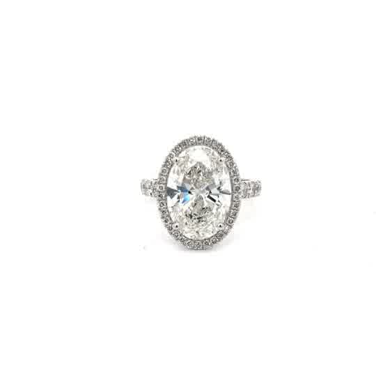 Oval Brilliant Cut Diamond Solitaire Engagement Ring in Polished White Gold