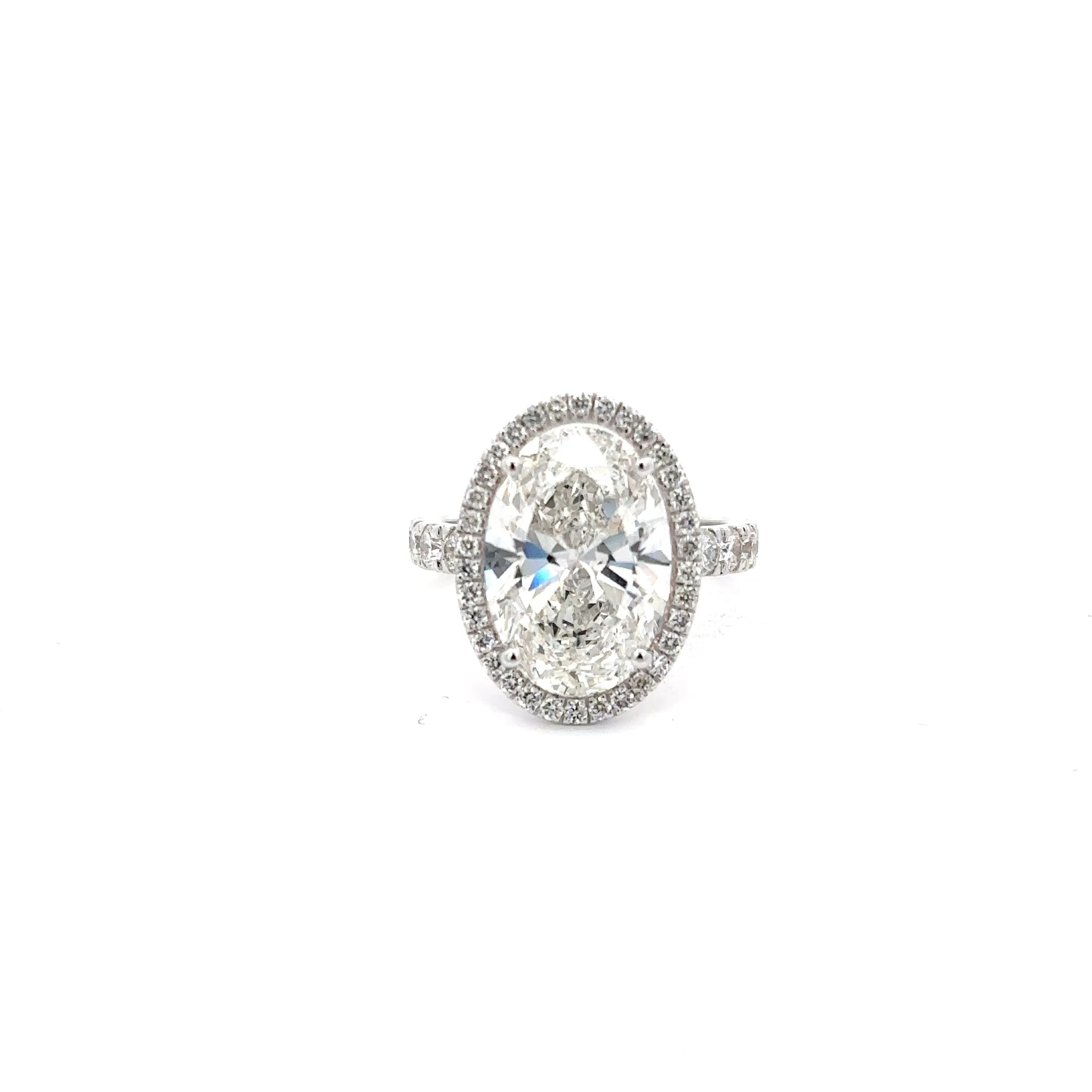 Oval Brilliant Cut Diamond Solitaire Engagement Ring in Polished White Gold 2