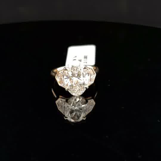 Oval Brilliant Three-Stone Diamond Ring in Yellow Gold