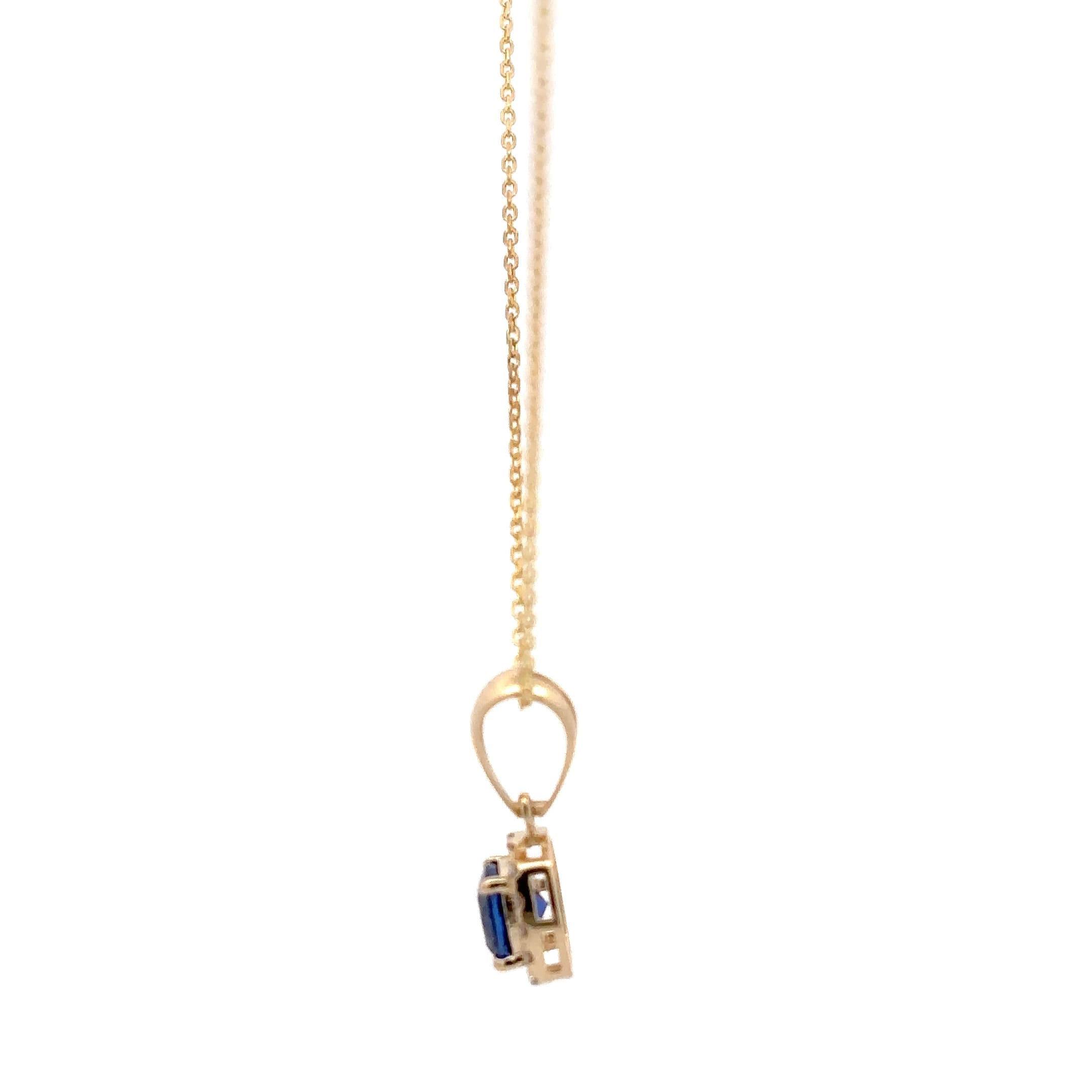 Cushion-Cut Sapphire Halo Pendant in Yellow Gold. 1.44g 3