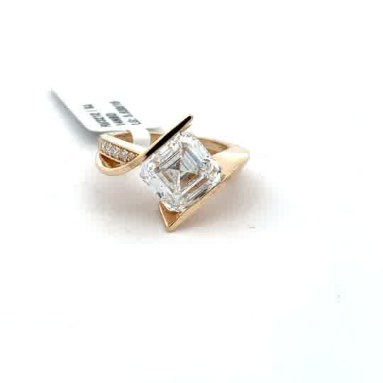 Modern Asymmetrical Diamond Solitaire Ring in Yellow Gold