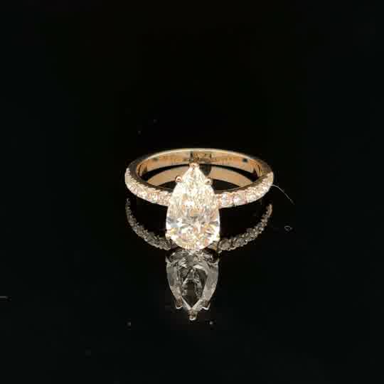 Pear Cut Diamond Pavé Engagement Ring in Yellow Gold. 2.59g