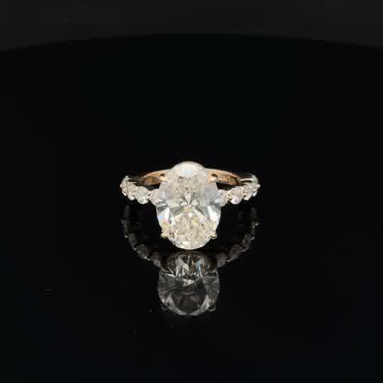 Yellow Gold Oval Diamond Ring with Accent Stones