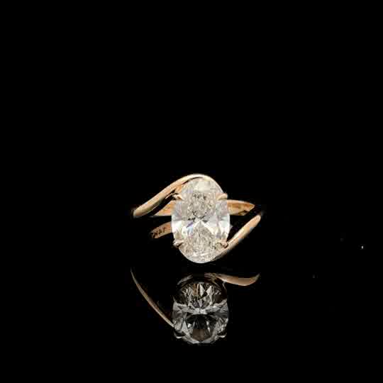 Oval Diamond Bypass Solitaire Ring in Yellow Gold